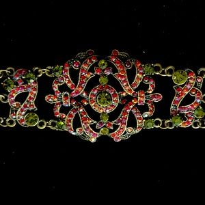 Retro style Art Deco choker. Peridot & Red stones Bronze finish 2”x1 3/4” centre